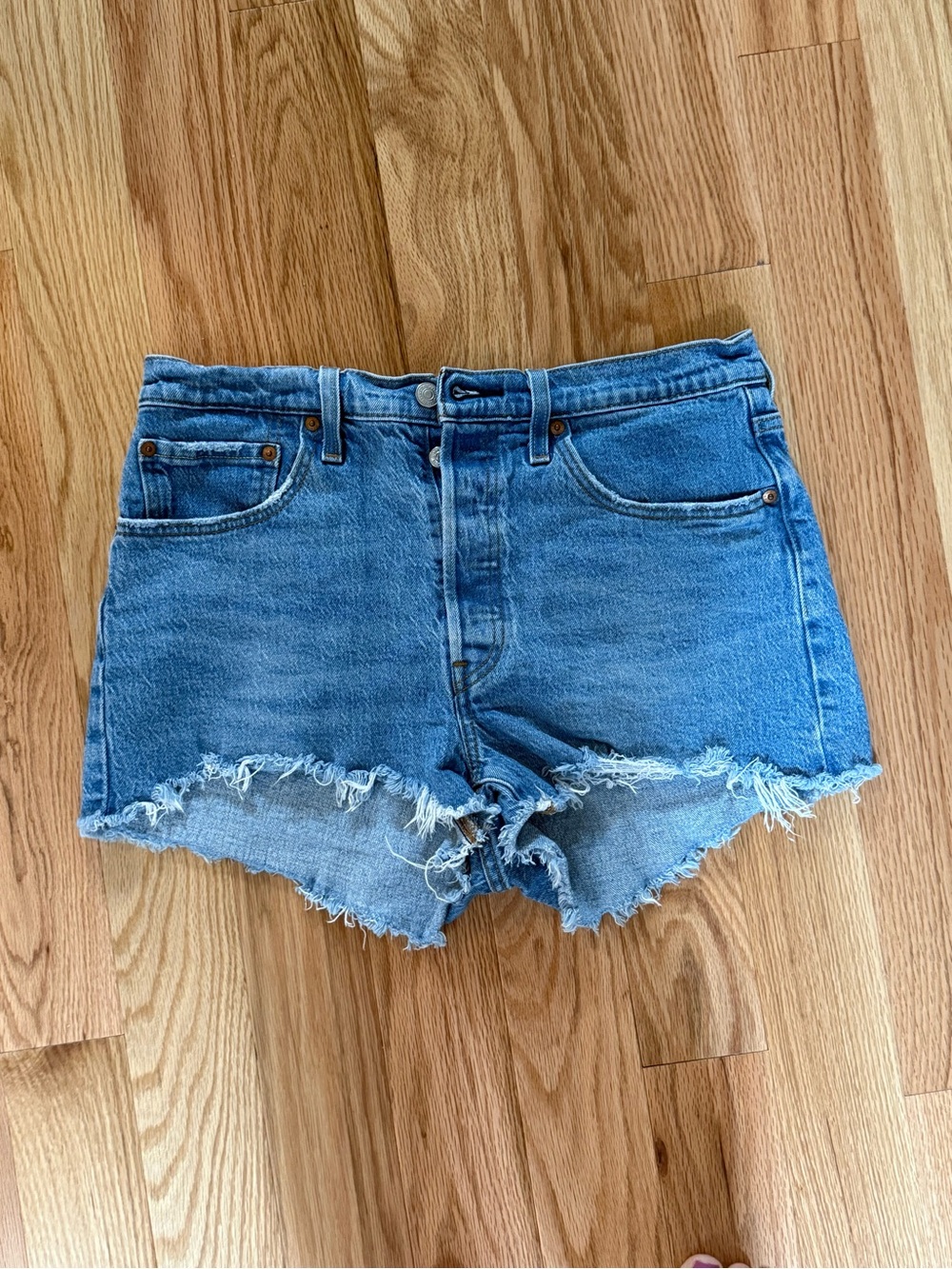 Levi’s Blue Jean Shorts with Distressed Frayed Hem